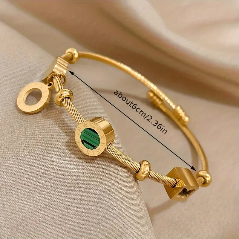 Celeste Gold Bangle with Geometric Charms