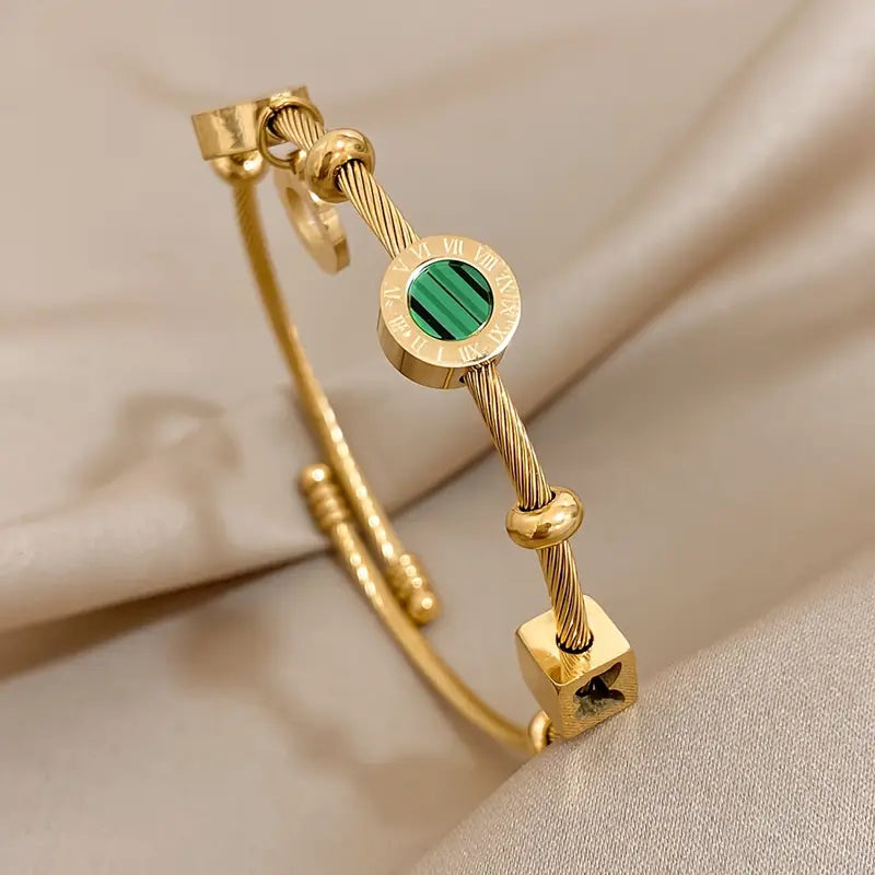 Celeste Gold Bangle with Geometric Charms