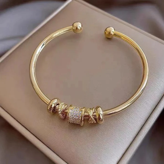 Gold Bangle Bracelet with Decorative Charms - Diva